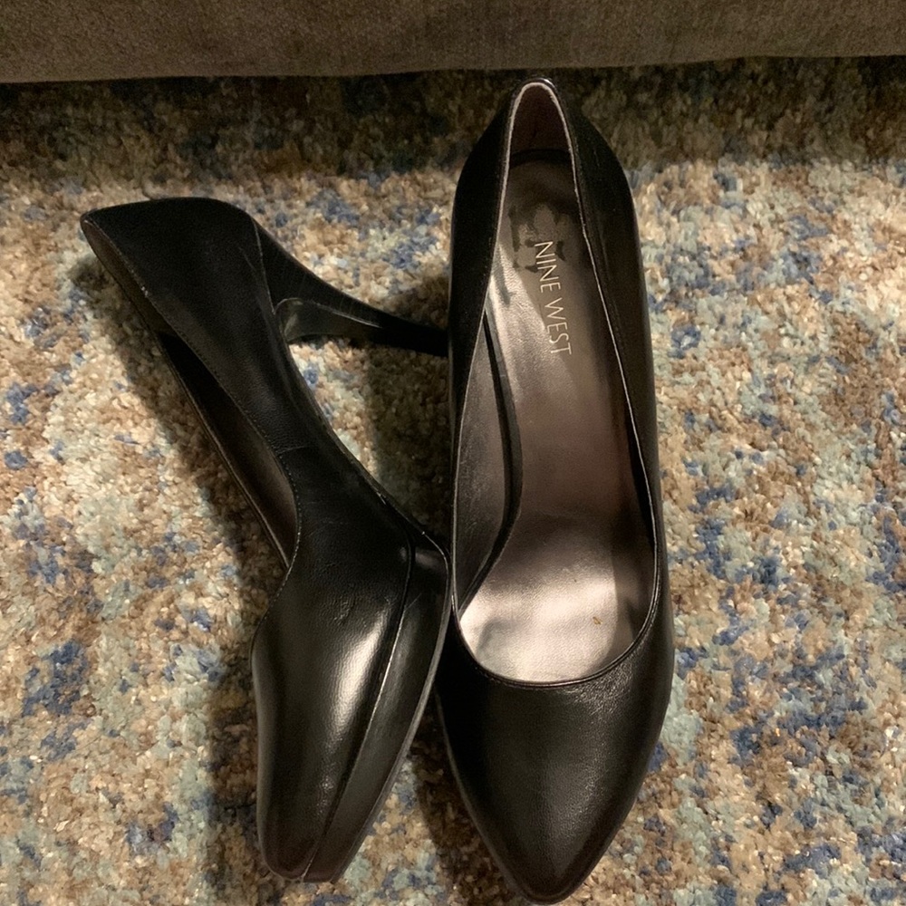 Black Nine West platform heels.